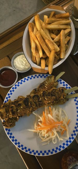 French fries & mushroom skewers at Sundays  in Phnom Penh