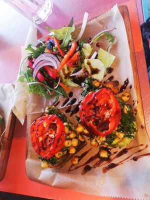 Chickpea avocado toast at Fellini Római Kultúrbisztró in Budapest