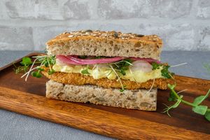 The Danish - pan fried white fish, Pickled Red Onions, Arugula & Remoulade sauce  at ChefShack in Cascais