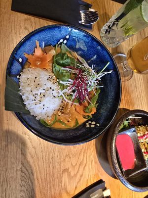 tofu and sticky rice with peanut and coconut saucee  at Ginya Vegan House  in Hamburg