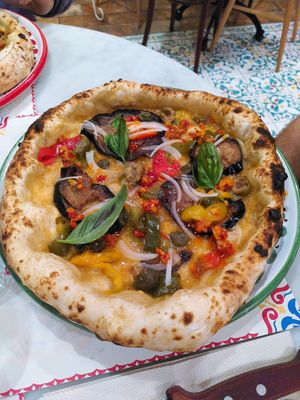 Pizza calabrese vegan at Pizzium in Bologna