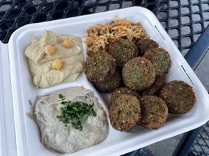 Dinner Platter - hummus, baba ganoush, falafel and lentil/rice dish    at Dahab Falafel Co in Durham