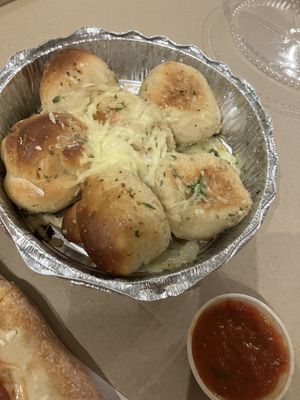 Garlic knots with vegan cheese  at Famous Joe Pizzeria in Brooklyn