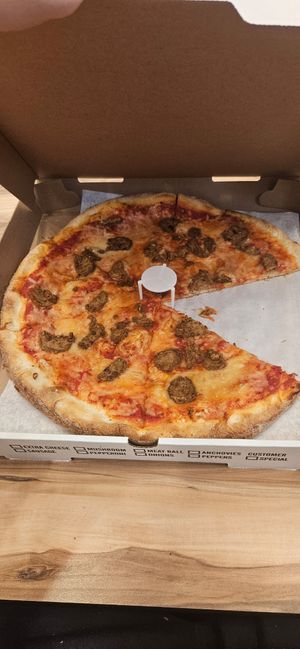 Standard vegan medium cheese with vegan meatballs at Famous Joe Pizzeria in Brooklyn