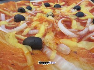 Tarte flambee with tomato sauce and vegan cheese at Ilse in Saarbrucken