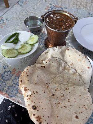 Black Dahl with two plain tawa roti. at Jai palace in Bangkok