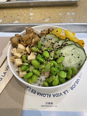 Customised poke bowl with heura “chicken” and tofu  at Aloha Poke Sevilla in Sevilla