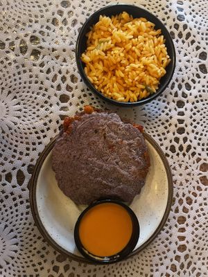 Gordita with blue corn and Spanish rice   at La Fonda Del Sol Restaurant in Espanola