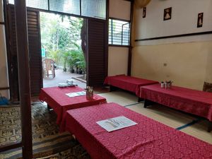 Indoor Dining Area at Govinda's Yogi Cafe in Mysore