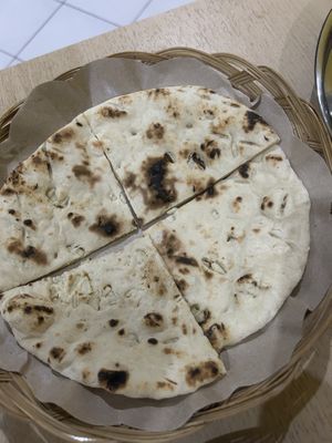 garlic naan  at Qnara Indian Food in Sidemen