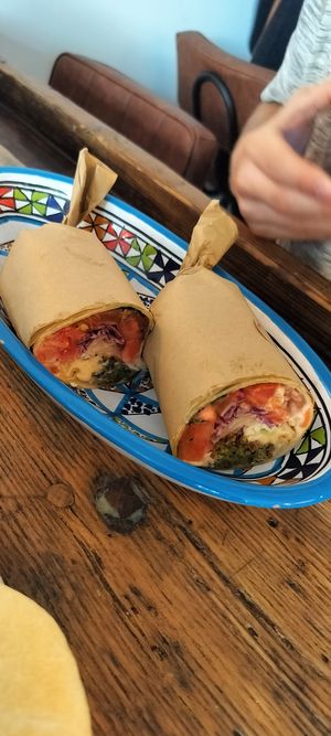 Wrap: lettuce, tomatoes, cabbage, cucumber, falafel, saus... at FLFL - Den Haag  in The Hague