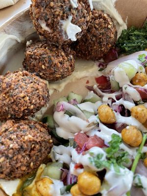 All the hummus in the falafel salad  at FLFL - Den Haag  in The Hague