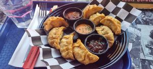 Roulette - 8 random flavours with sriracha, peri mayo, and BBQ dips. at Desert Island Dumplings in Manchester