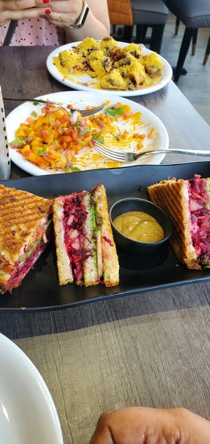 Bombay triple decker sandwich, masala chilli fries, sev puri at New Freezeland in Mississauga