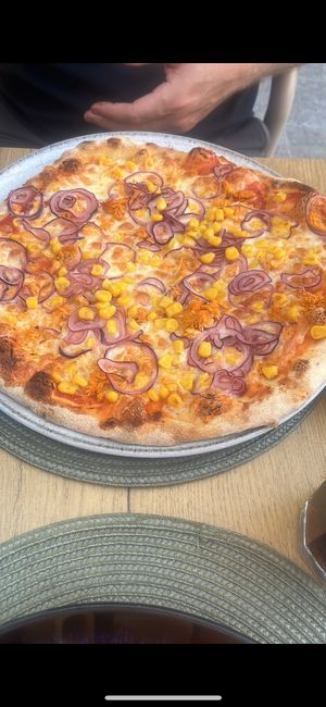 My partners - Chicken, sweetcorn and onion dairy pizza - options for everyone in your group  at Bella Pizzeria in Portimao