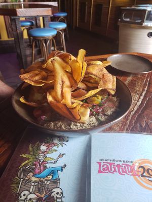 Plantain chips and hummus with heirloom tomatoes at Beachbum Berry's Latitude 29 in New Orleans