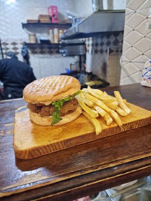 Falafel burger comes with fries at MIDO'S in Chefchaouen