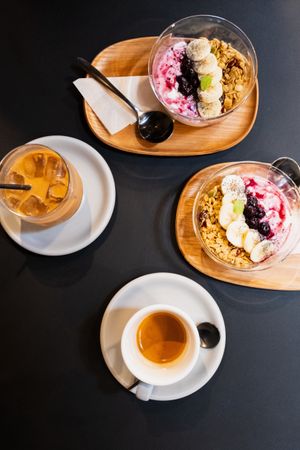 2 granola bowls, double espresso and iced oat latte  at Falo Coffee Brewers in Takayama