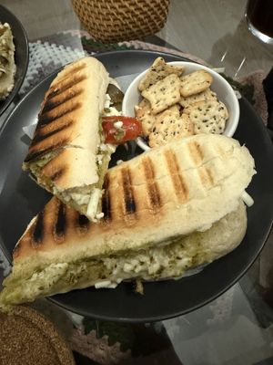Mozzarella Sheese, pesto and mixed grilled veg panini with ZENB cracker bites  at Canterbury Tails Cat Cafe in Canterbury