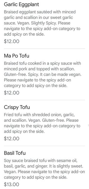 Vegan denoted by green dot on printed photo menu at Kitchen Master in Frisco