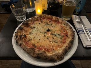Margherita with vegan cheese and capers  at Sottocasa Pizzeria in Brooklyn