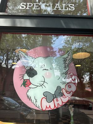 Sign out front  at Mallo's in Troy