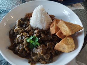 Cocked eggplants with rice and Fried tofu. 45k at Zaitun Restaurant Amed in Abang