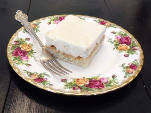 Vegetarian Margaret Houston's Historic White Cake. 
Meringue based cake flavored with almond and bourbon, frosted with a roux based Ermine frosting.
 at C.A.T. Cafe Bakery in Huntsville