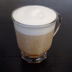 Vegan Candied Orange Spice Tea Latte with Oat Milk at C.A.T. Cafe Bakery in Huntsville