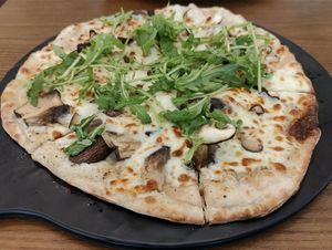 Wild mushroom with truffle pizza with vegan cheese at Original Greens in Central Singapore