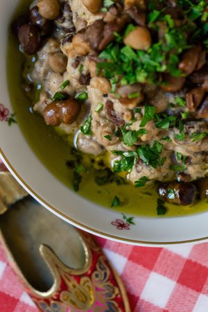 Foul - legendary street food. Chickpeas and broad beans mixed in Syrian way with olive oil, cumin, lemon juice and a spoon of hommos. Yes, you will be full. at Suwayda Streetfood in Krakow
