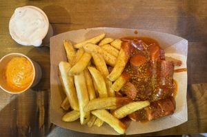 Vegan curry wurst with fries and vegan baconaise .  at Frittenwerk - Designer Outlet in Berlin