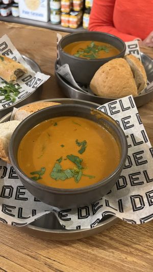 Soup of the day (tomato-lime with coconut cream)  at De Deli in Amsterdam