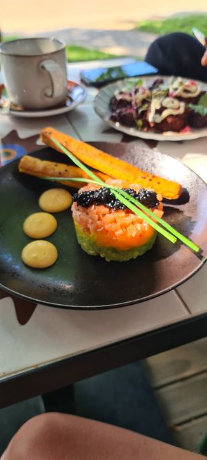 We had a "salmon" tartar and sweet potato pancakes, some coffee and the croissant. Everything was very good, except the pancakes were a bit over baked and bland. at Nihe in Tallinn