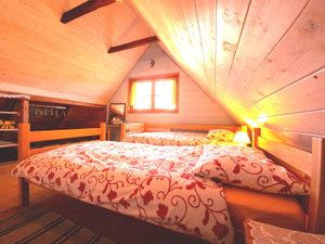 Badroom in the attic at House Koliba in Janja Gora