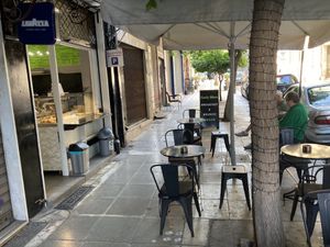 Front with outdoor seating at Early Bites in Athens