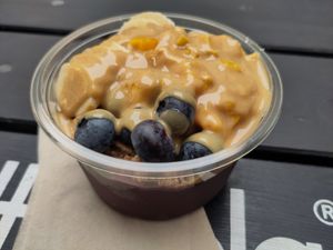 Acai bowl with granola and peanut butter at Superfood Deli 1010 in Vienna