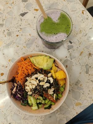 Lunch bowl with carrot lax and lavender matcha latte. at Superfood Deli 1010 in Vienna