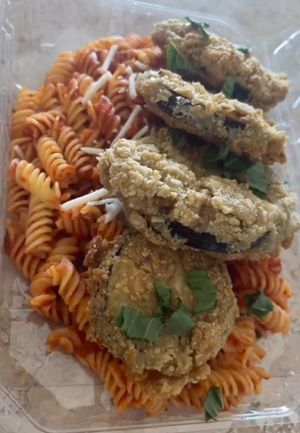 Vegan Eggplant Parmesan over Fusilli with Homemade Marinara at Plant Based Puerto Vallarta in Puerto Vallarta