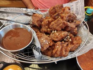 Chicken with spicy hot pot sauce at Vampire's Chicken in Seoul