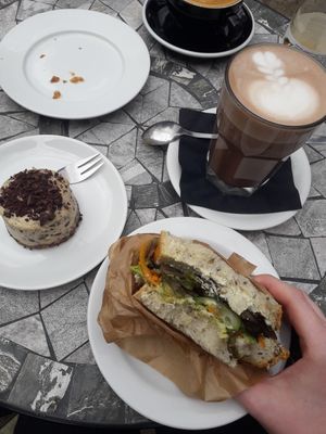 Vegan sandwhich, stracciatella cake, hot chocolate with oat milk at MiiT in Riga