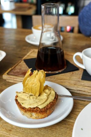 Coconut/Pistachio cream cake (vegan) at MiiT in Riga