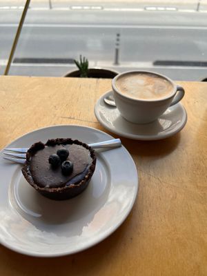 Oat flat white and the chocolate tart.  at MiiT in Riga