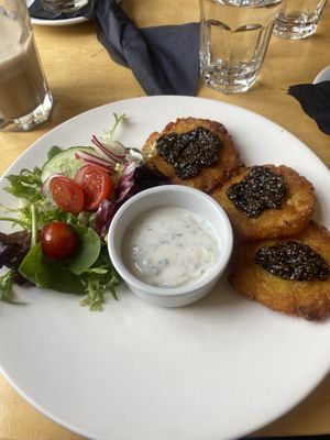 Potato pancakes with chia caviarr  at MiiT in Riga