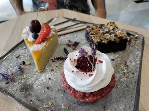 Mango cake, amazing berry cupcake with hidden cream inside, and choc hazelnut brownie for breakfast! at VíK - Vegan Venue in Bratislava