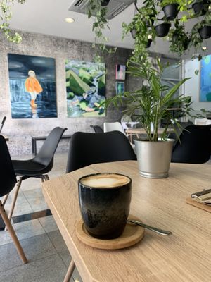 cappuccino at the spot 🦋  at VíK - Vegan Venue in Bratislava