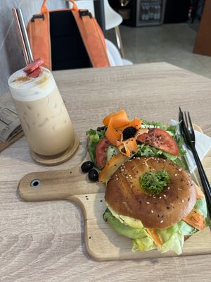 Tofu Bagel and iced Lavender latte  at VíK - Vegan Venue in Bratislava