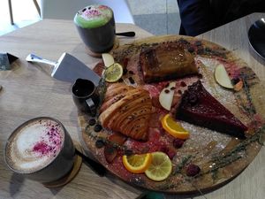 Hot chocolate, matcha latte, croissant, apple pie, cherry&chocolate pie at VíK - Vegan Venue in Bratislava