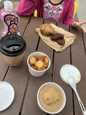 QUICK VEGAN BREAKFAST: cute outdoor seating!! $1 coffee w/coconut milk, breakfast potatoes, biscuit w/ gravy. Blueberry muffin & ginger cookie. Deli & bakery items change daily! at Ocean Beach People's Organic Foods Deli in San Diego