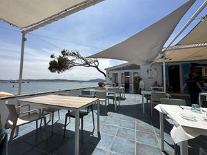 Outdoor seating and view  at Zì Antò in La Maddalena
